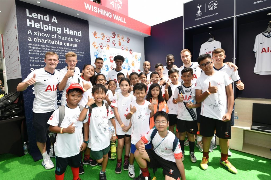 Ndombele and the Spurs team at the AIA event