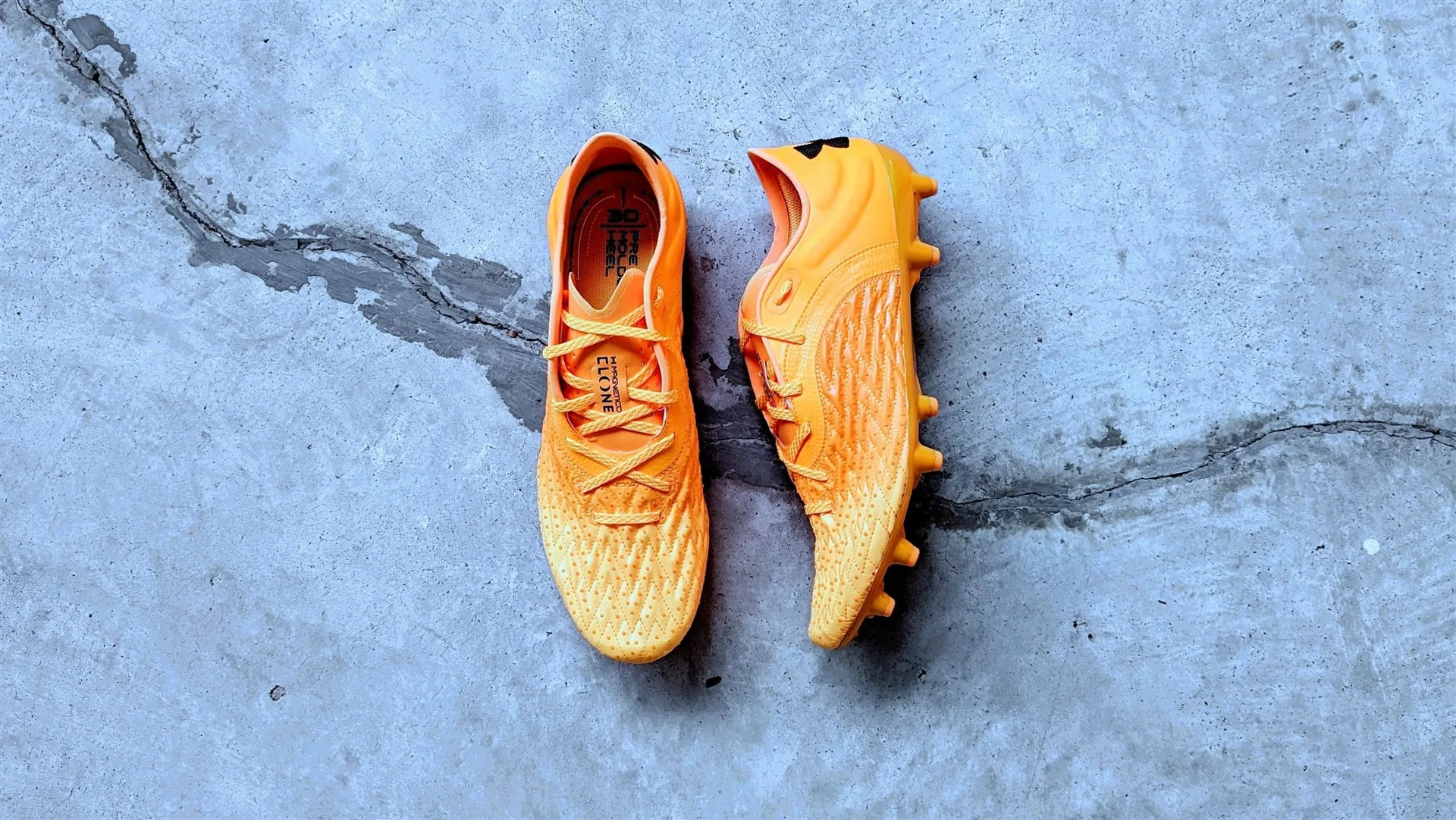 Under armour football boots clearance orange